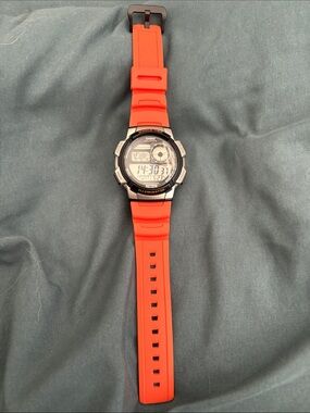 Casio Orange Digital Sports Watch with World Time | 10 year battery